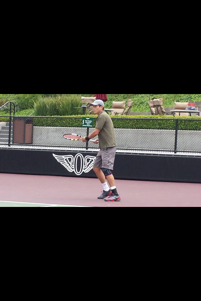 Omar playing tennis