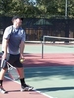 Evan playing tennis